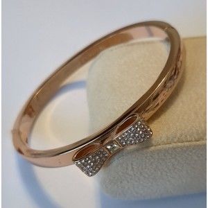 Kate Spade crystal and rose gold bow bracelet